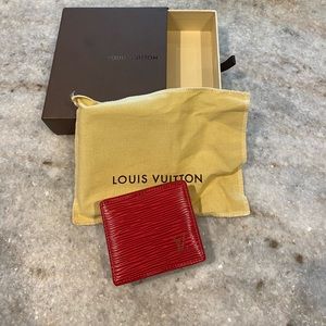 Louis Vuitton change purse. Brand new never used.